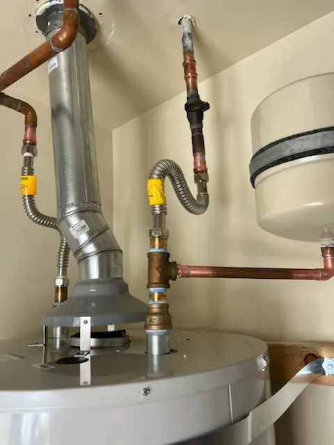 Water heater installation and plumbing repair in Downtown Clayton